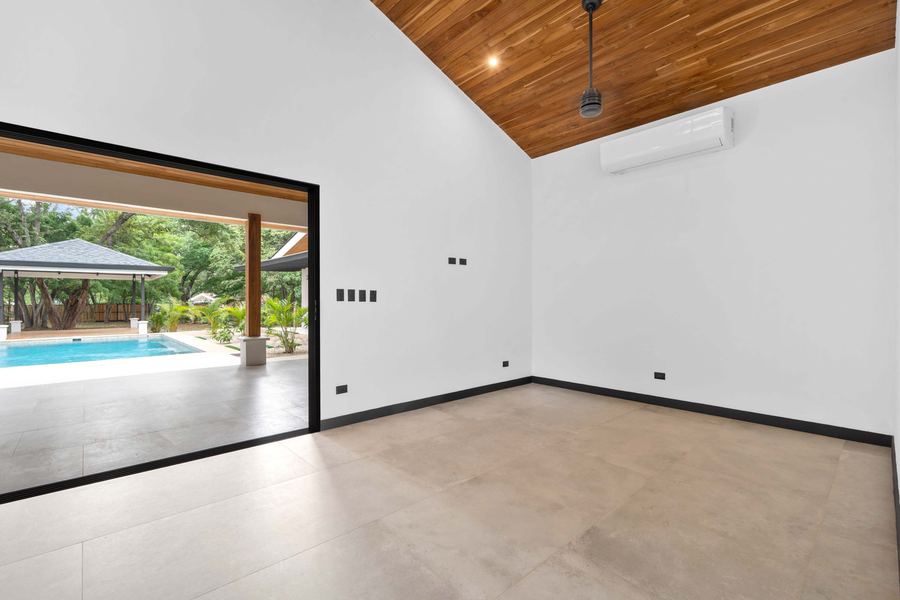 Suite with sliders opening directly to the pool terrace